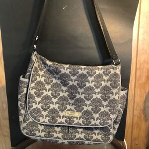 Bumble diaper bag. Gray with black floral pattern.